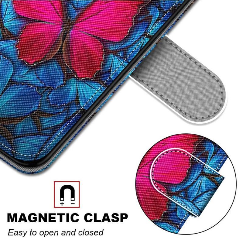Flipové Pouzdro Na Samsung Galaxy M23 5G Červený Motýl Modré Pozadí