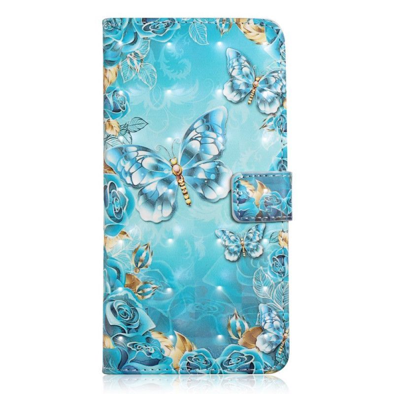 Flipové Pouzdro Xiaomi Redmi 7a Motýli A Květiny Na Modrém Pozadí